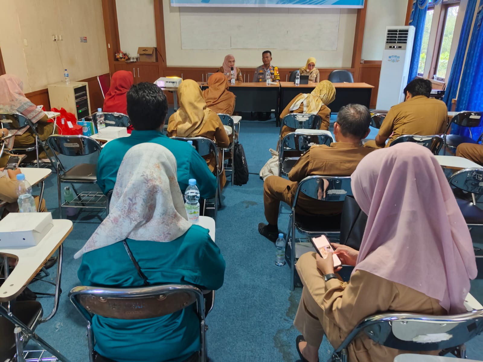 Sambangi Dinas Kesehatan, Satbinmas Polres Rohul Sampaikan Pesan Damai Pilkada 2024