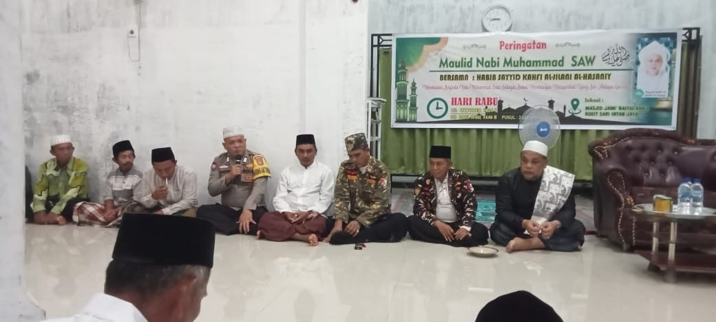 Polsek Pulau Burung Ajak Masyarakat Jaga Kedamaian Pilkada 2024 di Peringatan Maulid Nabi