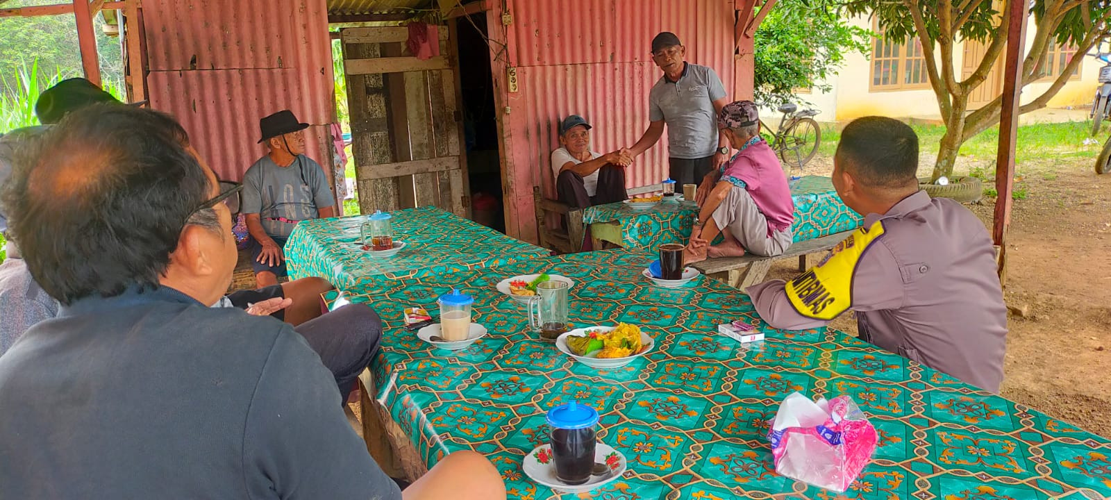 Wujudkan Pilkada Damai, Bhabinkantibmas Polsek Rambahhilir Cooling System Door to Door