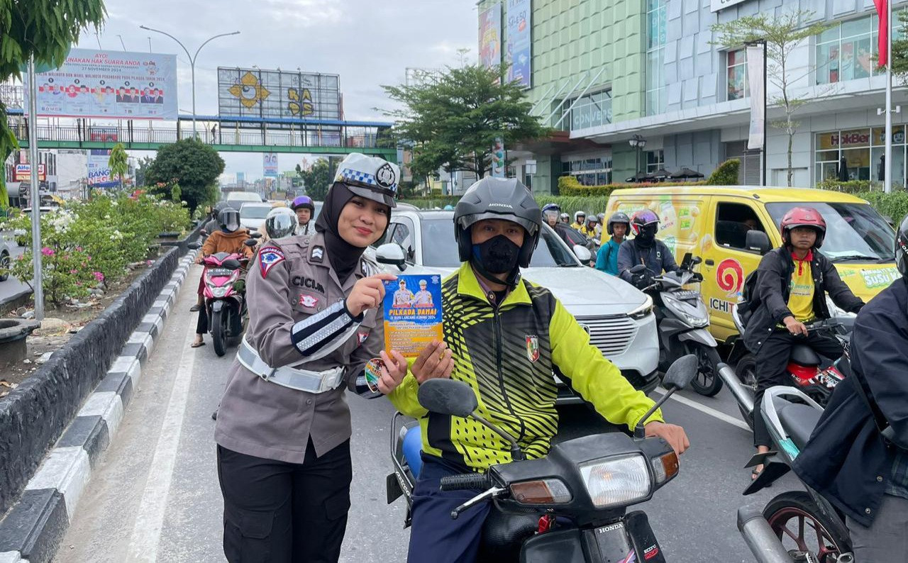 Satlantas Polresta Pekanbaru Edukasi Keselamatan Berlalu Lintas Ciptakan Pilkada Damai