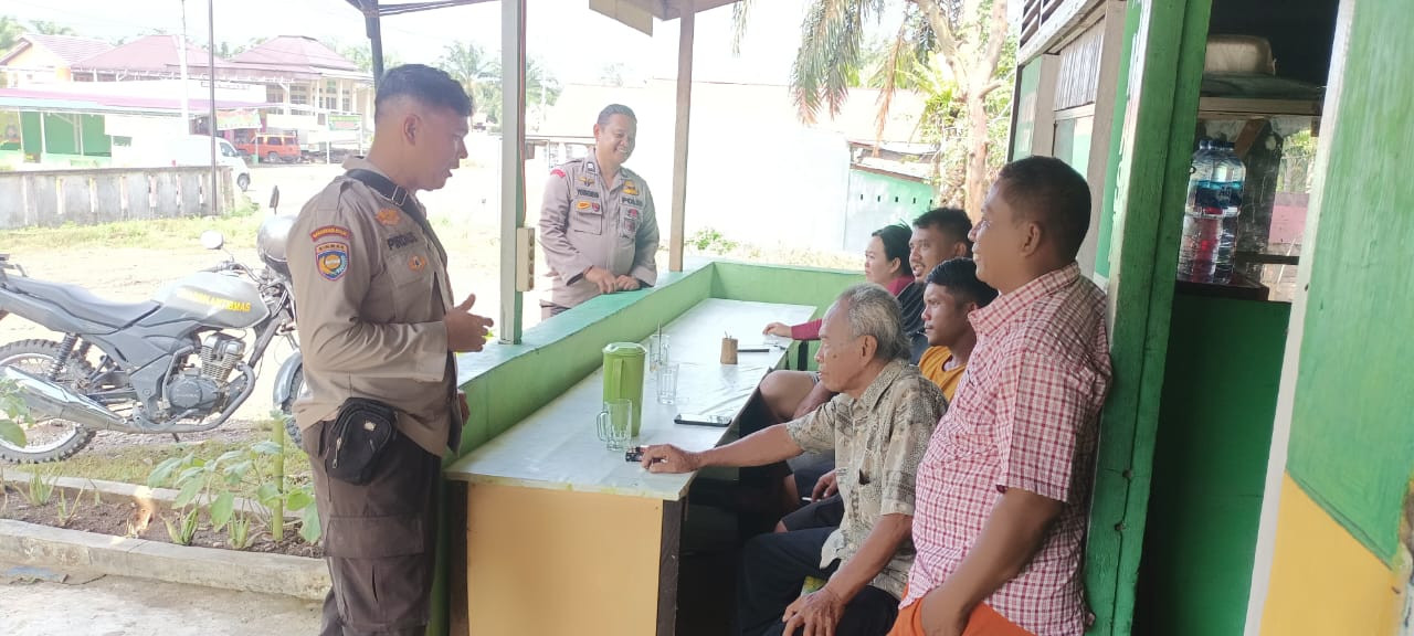 Personel Polsek Rambah Samo Gelar Cooling System Ajak Warga Desa Digital Sukseskan Pilkada