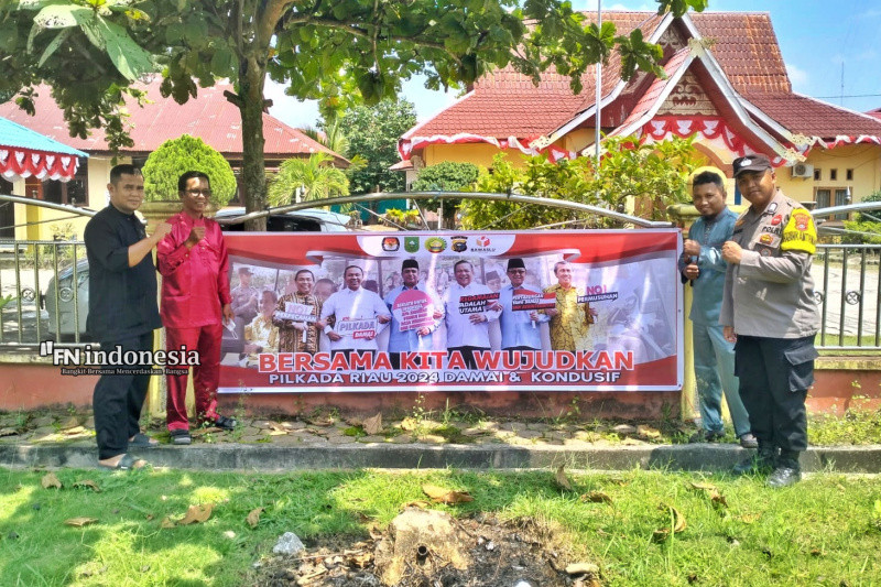 Jelang Pilkada, Polsek Mandau Pasang Spanduk Setiap Kelurahan dan Desa