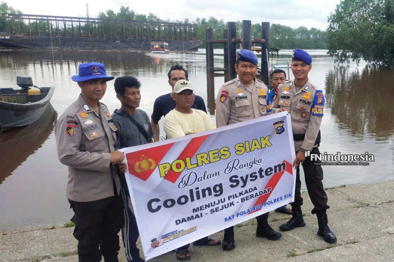 Polres Siak Edukasi dan Sosialisasi Pilkada Damai di Pelabuhan Penyebrangan Sampan