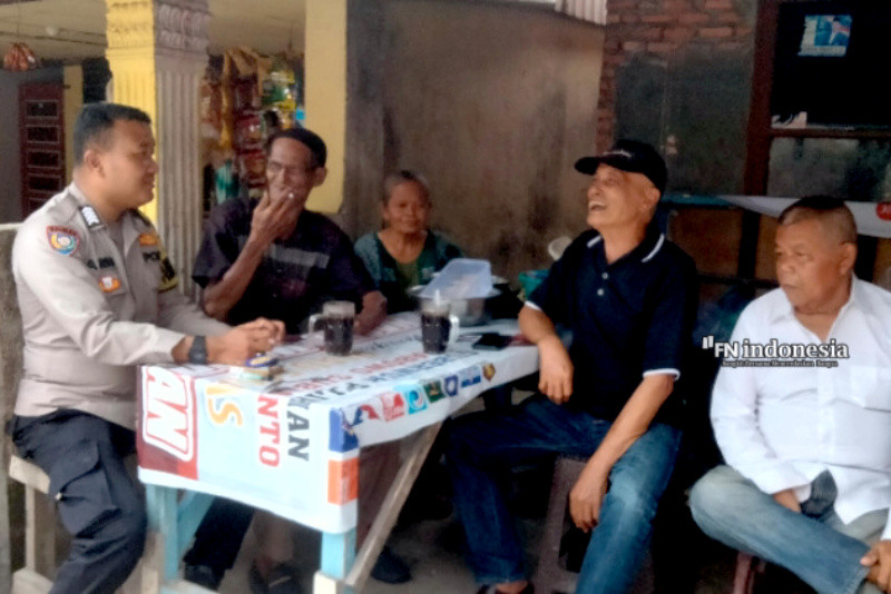 Bhabin Pekanbaru Kota Sampaikan Pesan Pilkada Damai Dengan Semangat yang Gembira