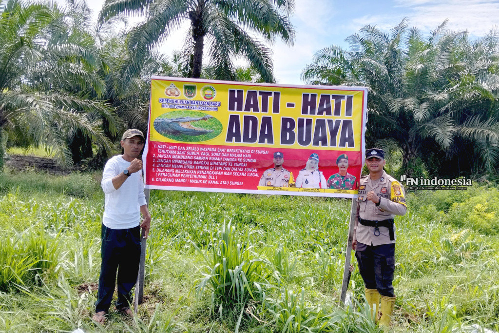 Waspadai Buaya! Polsek Batu Hampar Pasang Spanduk Peringatan di Sungai Bantaian Baru