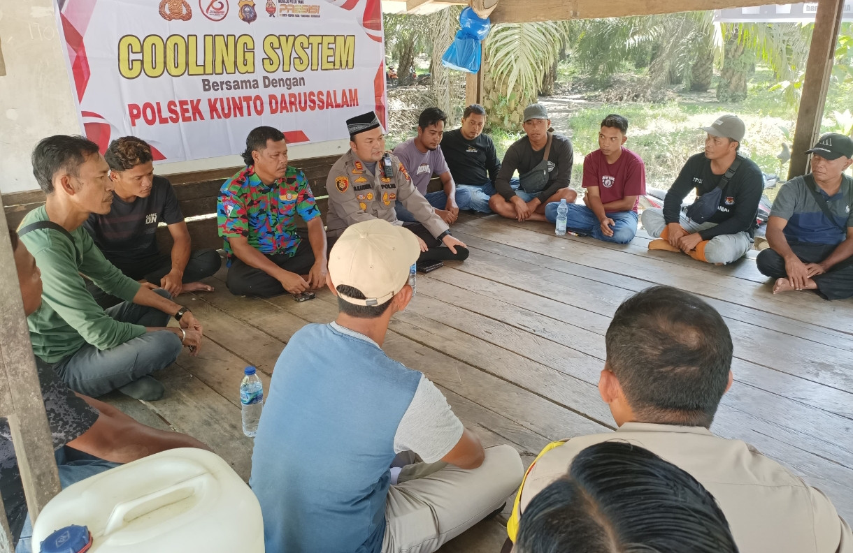 Kapolsek Kunto Darussalam, Sosialisasikan Cooling System dan Ajak Warga Wujudkan Pilkada Damai