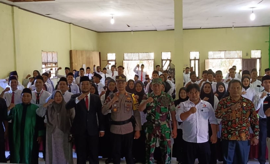 Kapolsek Tambusai Sampaikan Pesan Kamtibmas dan Cooling System Pada Pelantikan Pengawas TPS