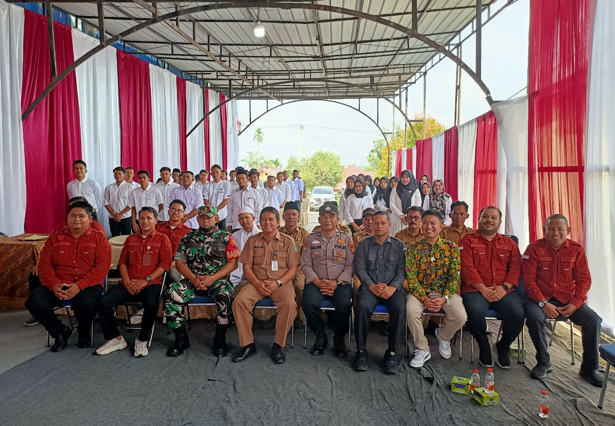 Ps Kanit Binmas Polsek Kunto Darussalam Hadiri Pelantikan Pengawas TPS dan Sampaikan Cooling System