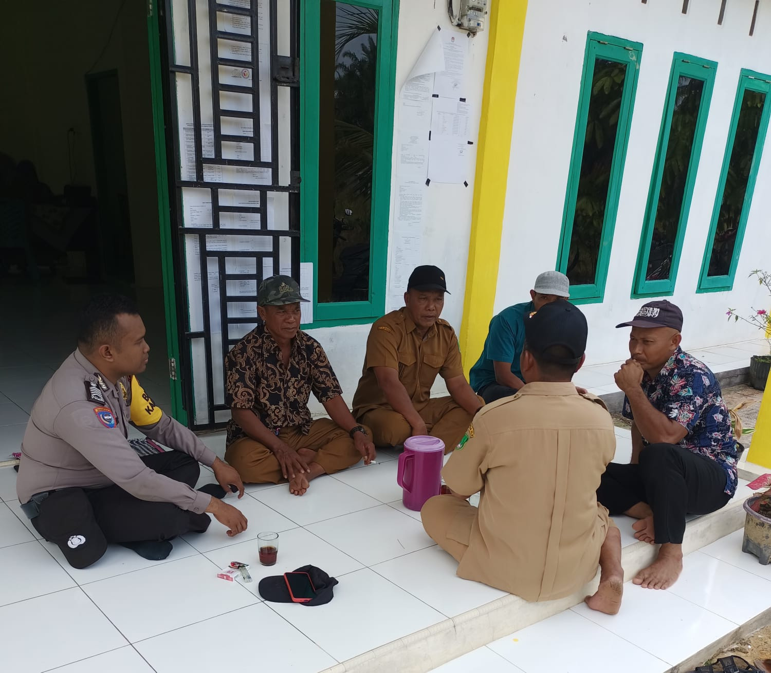 Polsek Pujud Sampaikan Pesan Cooling System ke Warga Sei Meranti Darussalam
