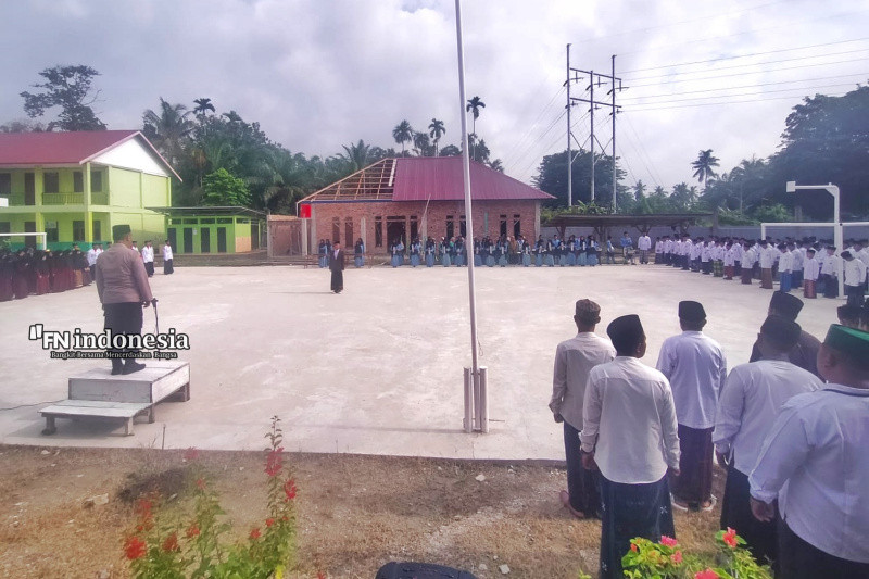 Giat Upacara Hari Santri Nasional, Polsek Sabak Auh Ajak Santri Ciptakan Pilkada Damai